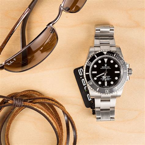 Rolex Submariner Review: 114060 & 116610 